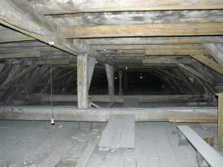 Restauration d'une charpente du XVème siècle