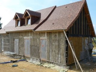 Enduits sur murs en paille