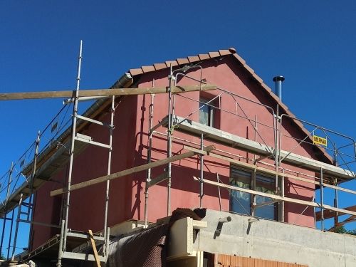 Enduits chaux-sable et badigeon  sur maisonnette paille