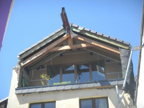 Projet de rénovation et rehausse d'une maison unifamiliale pour intégrer un atelier de lutherie