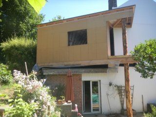 Extension en Paille  d'une petite maison de ville