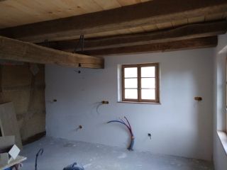 Enduits à la chaux et restauration de torchis