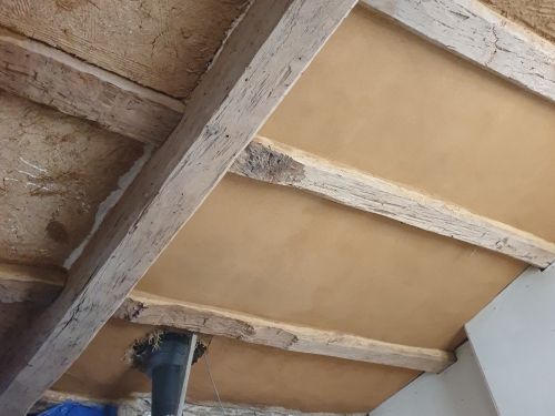 Enduit terre sur torchis