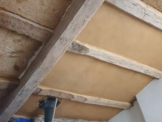 Enduit terre sur torchis