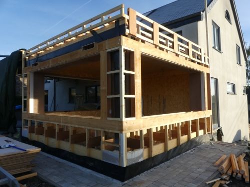 Extension en structure bois légère, avec miscanthus