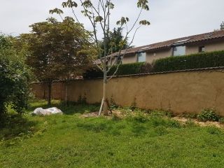 Restauration d'un mur d'enceinte de pisé
