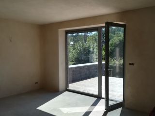 Enduits à la chaux dans une maison en blocs Ytong