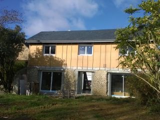 Réhabilitation d'une grange en habitation avec surélévation
