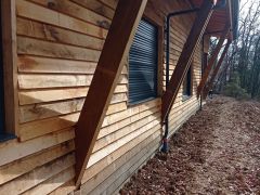 Une maison en bois en symbiose avec la foret