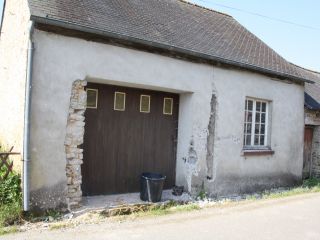 Remontage d'un mur massif en pierres