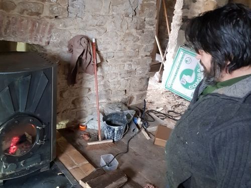 Installation d'un poêle bouilleur sur ballon de chauffage solaire