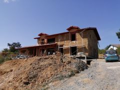 Enduits chaux sable sur maison en paille