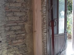 Chantier d'accompagnement / création d'un demi poteau pour sécuriser le scellement d'une poutre dans un mur