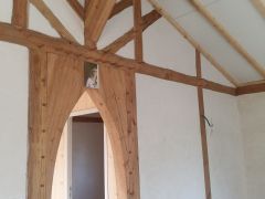 MAISON BOIS SOUS UN HANGAR