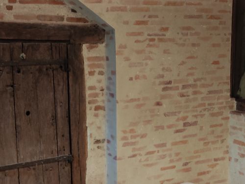 Trompe l'œil de briquettes de pays à la chaux