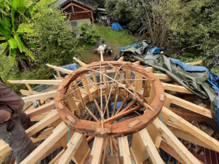 Maison rond en ossature bois et paille