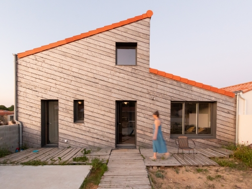Maison bois-terre-paille à l'orée des dunes