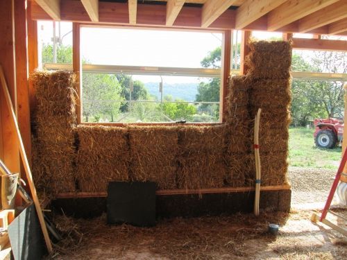 Pose de bottes de paille